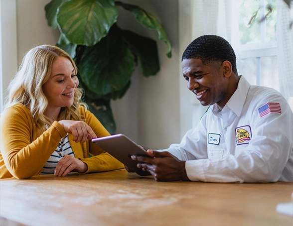 Sales staff explaining product to customer.