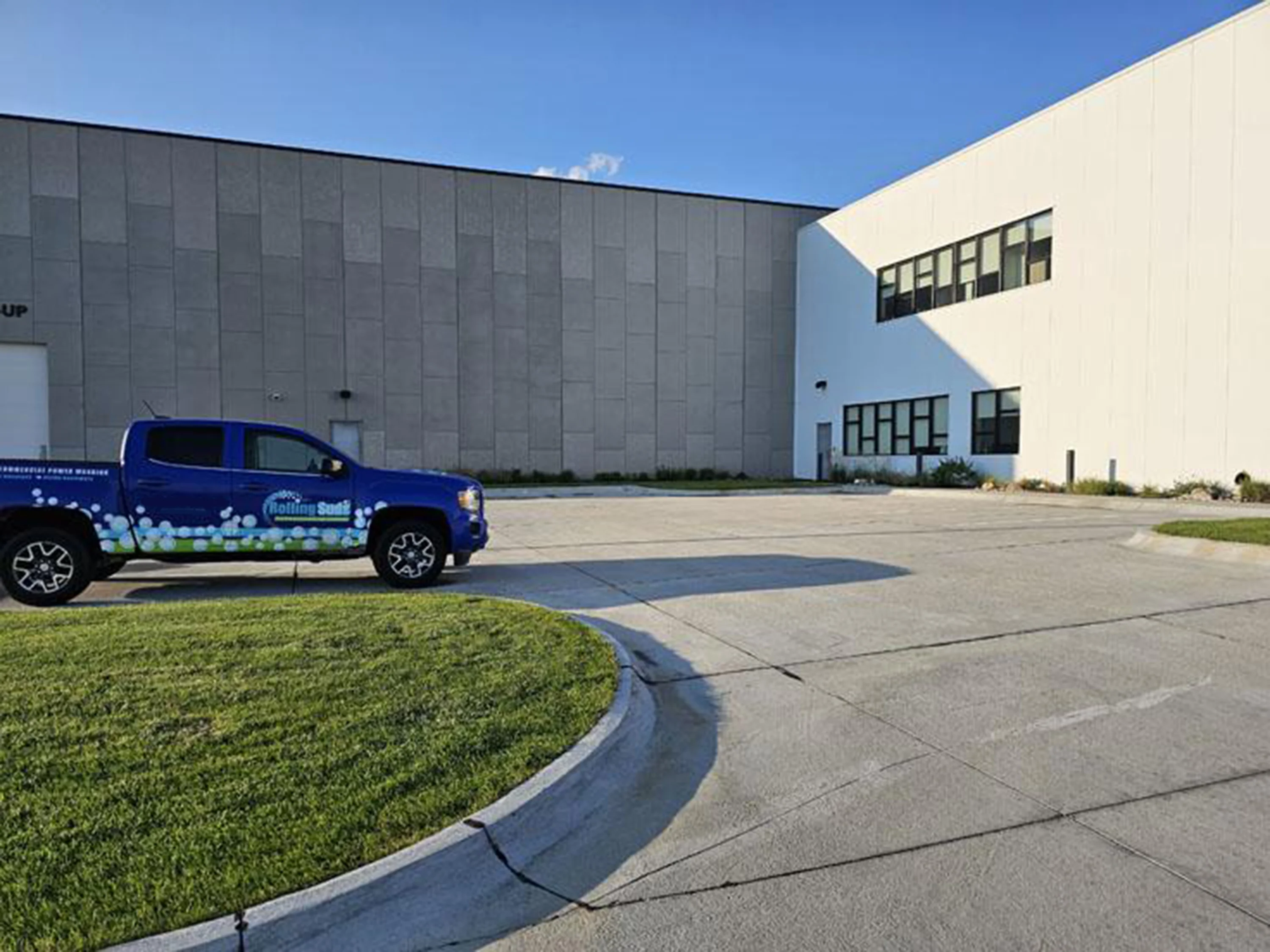Powerwashing a commercial parking area