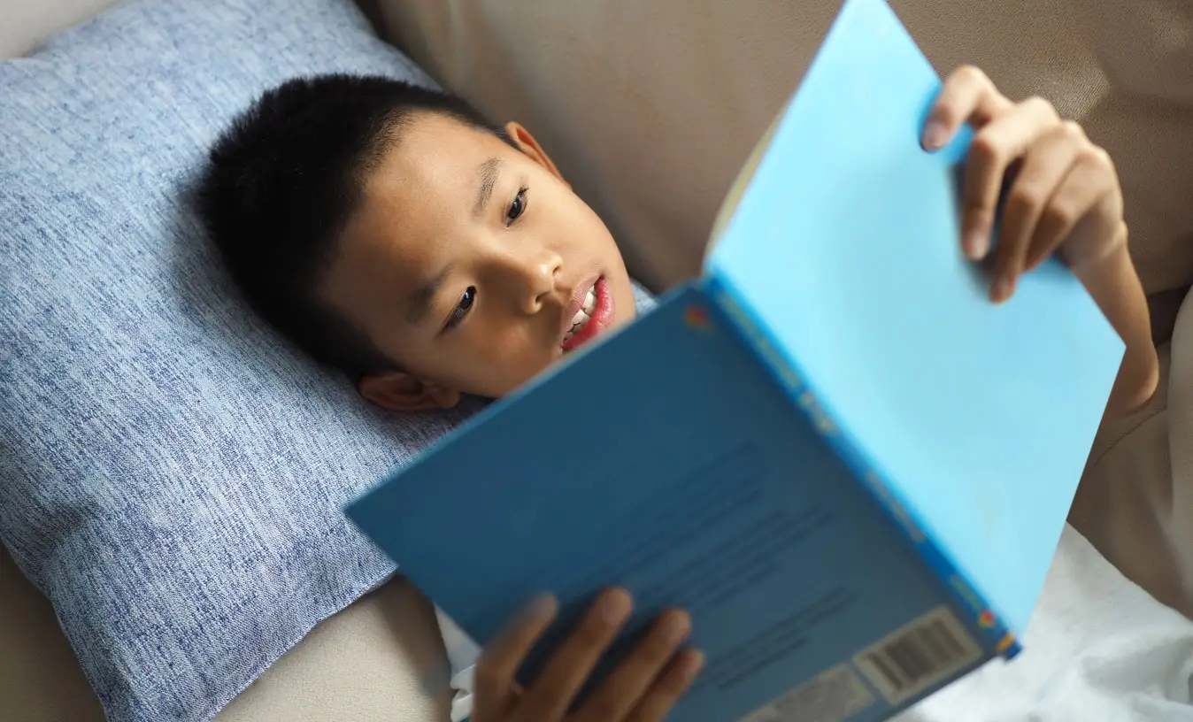 Student reading during a Kumon lesson